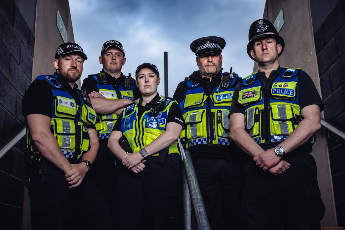 Five Football Cops Standing